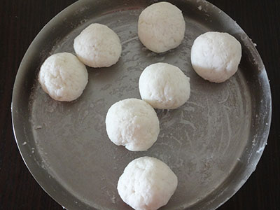 mixing the flour for akki rotti or rice roti using leftover rice