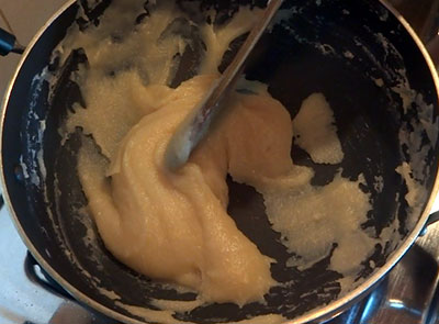 stirring badam burfi or badam katli