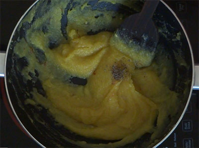 stirring badam halwa or almond halwa