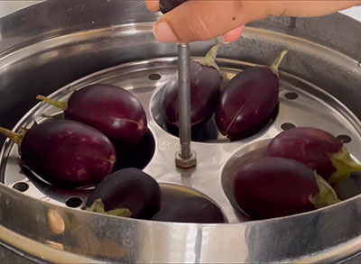 steaming brinjals for badanekayi mosaru gojju recipe