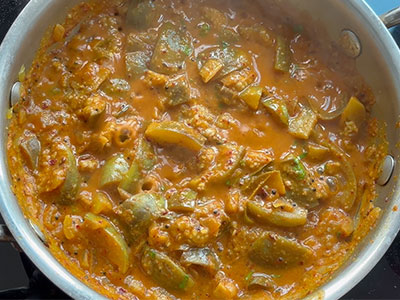 serving badanekayi rasa palya or brinjal gojju recipe