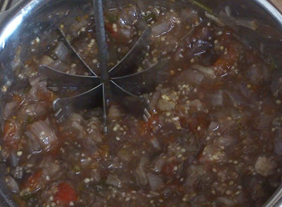 mash cooked vegetables for badanekayi gojju or brinjal curry