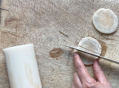 chopping banana stem for bale dindina palya or banana stem stir fry recipe