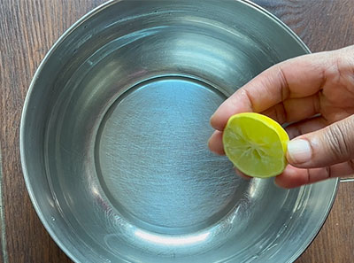 water and lemon juice for bale dindina palya or banana stem stir fry recipe