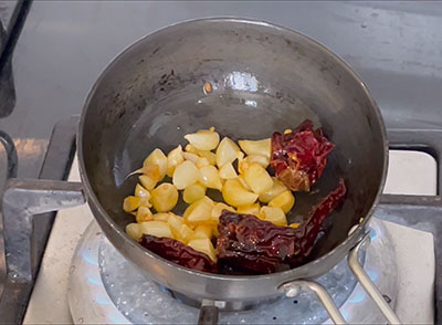 frying garlic for bellulli tambli or garlic tambuli recipe