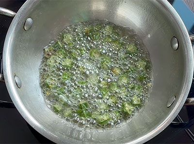 frying okra for bendekai mirpudi or ladies finger chutney powder recipe