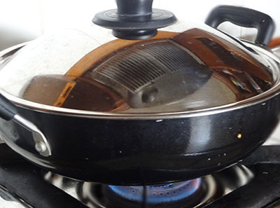 cooking cabbage for cabbage chutney or kosu chutney