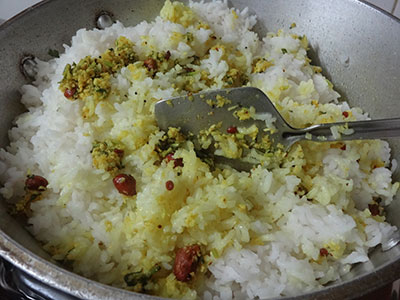 mixing lemon rice or chitranna