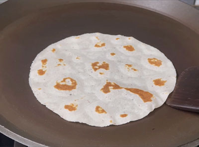 cooking kayi rotti or coconut roti recipe