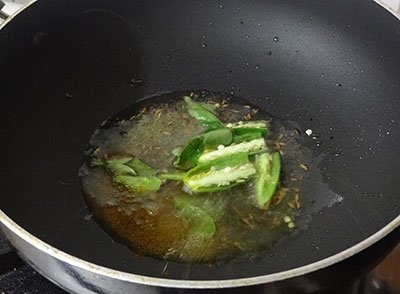 green chili and curry leaves for genasina palya or sweet potato stir fry