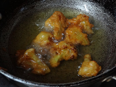 sliced gobis in the batter for gobi manchurian