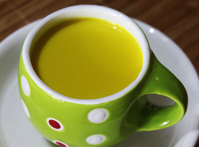 golden milk or turmeric milk recipe on pan