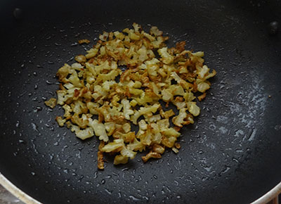 frying hagalakayi for bitter gourd chutney