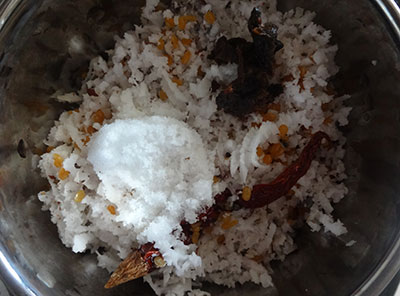 grinding coconut and spices for bitter gourd chutney