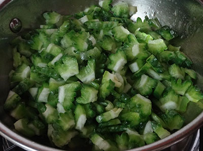 Chopped bitter gourd for hagalakayi palya or bitter gourd stir fry