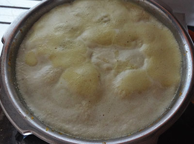 boiling hesaru bele saaru or mung dal rasam