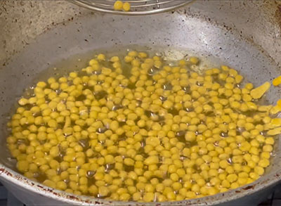 frying kara boondi or khara boondhi mixture