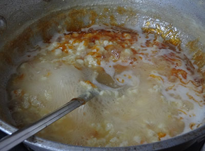 adding caramelised sugar to belgaum kunda or belgavi kunda