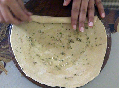 rolling layered paratha