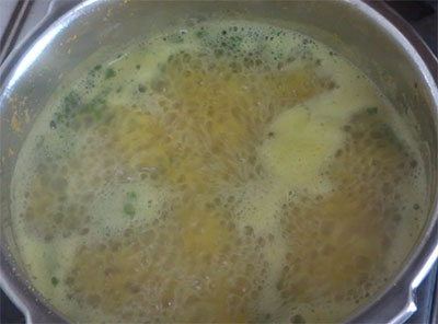 boiling nimbe hannu saaru or lemon rasam