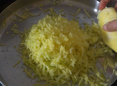 grated raw mango for raw mango jam or mavinakayi gulamba