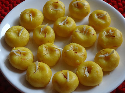 shaping the milk peda or doodh peda