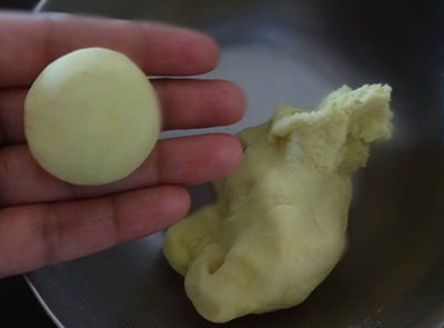 kneading dough for modaka and karigadubu