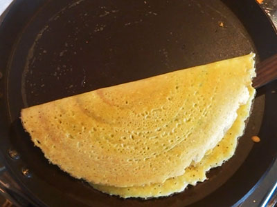 mung dal dosa or hesaru bele dose on pan