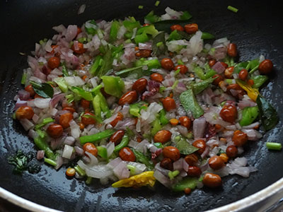 onion, green chili and curry leaves for nellikai chitranna or amla rice