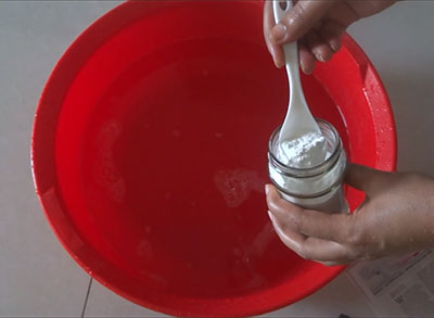 straining the tamarind pulp for how to clean oil bottle or container