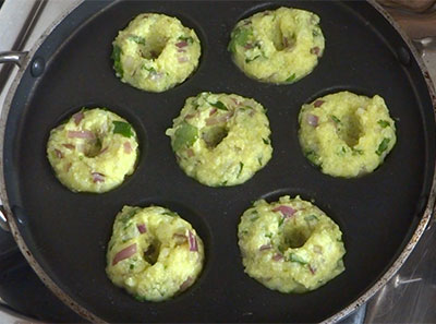 pour batter for making paddu using leftover rice