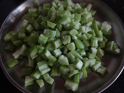 chopped snake gourd for padavalakai palya or snake gourd stir fry