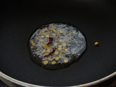 tempering for padavalakai palya or snake gourd stir fry