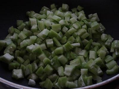 Chopped snake gourd for padavalakai palya or snake gourd stir fry