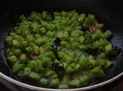 cooking padavalakai palya or snake gourd stir fry