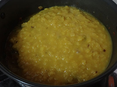 cooking Palak soppina palle or palak dal