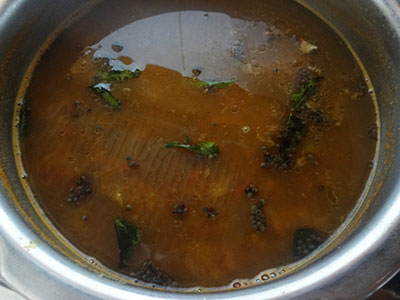 tempering menasina saaru or pepper rasam