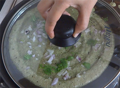 making hesaru kalu dose or pesarattu dosa