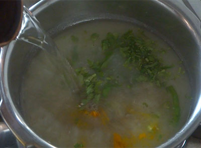 water for potato rasam or alugadde saaru