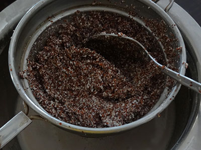 filtering the batter for ragi halbai or halubai