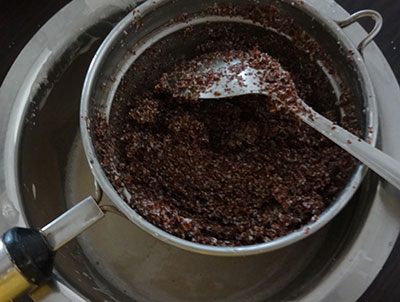 filtering the batter for ragi halbai or halubai