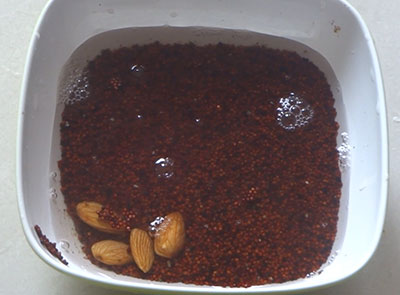 grind sesame seeds and jaggery for ragi milk or halu or milkshake or juice