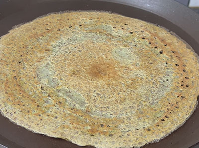 ragi hesaru kalu or mung bean dosa on pan