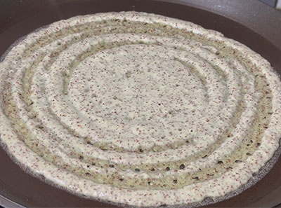 making ragi hesaru kalu or mung bean dosa