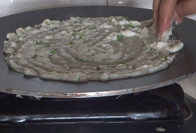 spreading batter for rava rotti or sajjige rotti