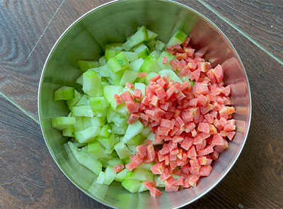 chopped cucumber and carrot for southekai kosambari or cucumber salad