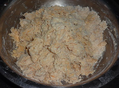 kneading the dough for suruli puri or suruli poori