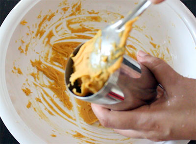 filling dough in the mould for thin kara sev mixture or omapodi mixture