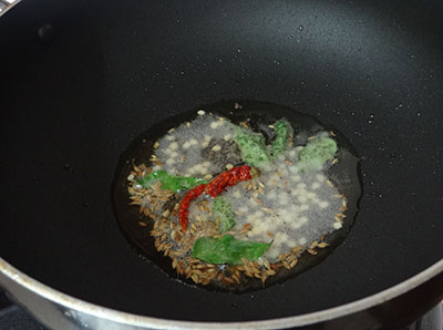 tempering for tomato onion chutney or red chutney