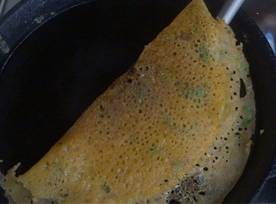 instant tomato rava dosa or tomato rave dose on iron pan